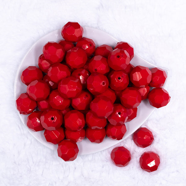 Top view of a pile of 20mm Red Faceted Opaque Bubblegum Beads