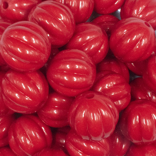 close up view of a pile of 20mm Red Opaque Pumpkin Shaped Bubblegum Bead