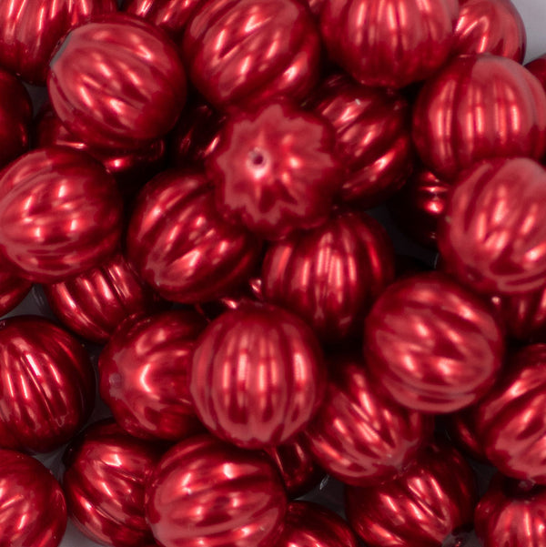 Close up view of a pile of 20mm Red Pearl Pumpkin Shaped Bubblegum Bead