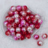 Top view of a pile of 20mm Red & Pink Ombre Shimmer Faux Pearl Bubblegum Beads