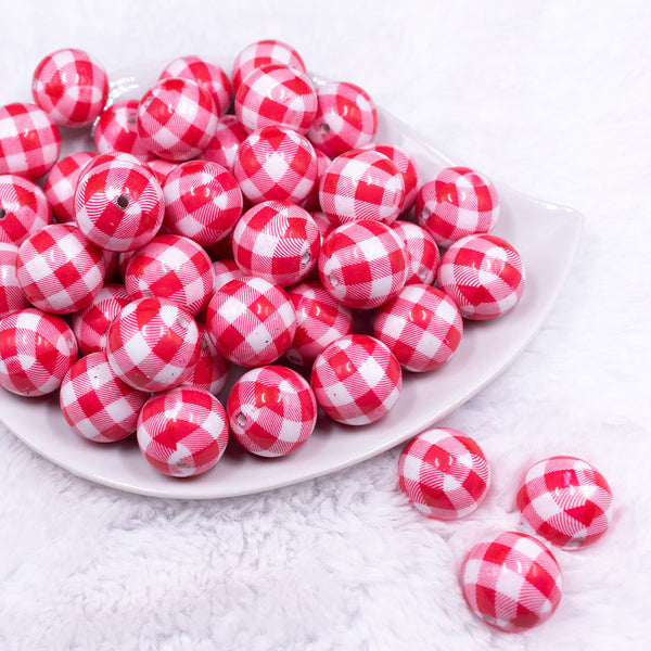Front view of a pile of 20mm Red & White Picnic Plaid Print Acrylic Bubblegum Beads