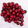 top view of a pile of 20mm Red Santa's Belt Acrylic Bubblegum Beads