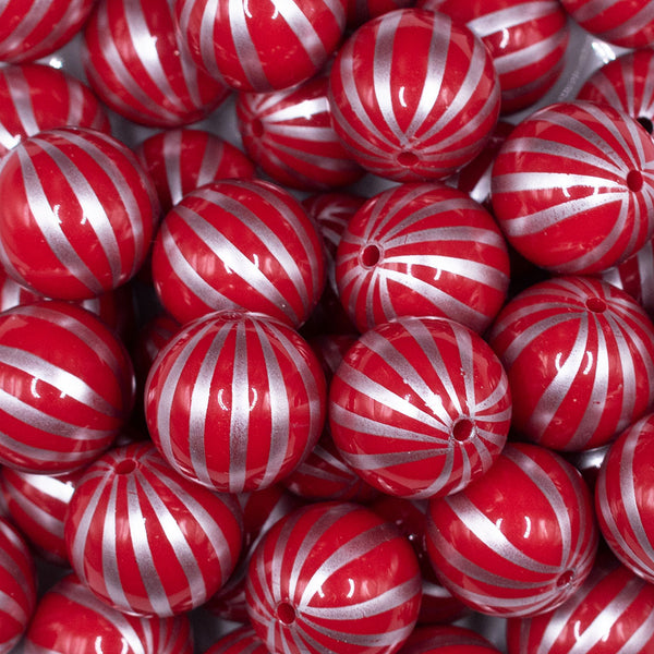 Close up view of a pile of 20mm Red with Silver Pin Stripes Acrylic Bubblegum Beads