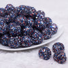 front view of a pile of 20mm Red, White and Blue Sequin Confetti Bubblegum Beads
