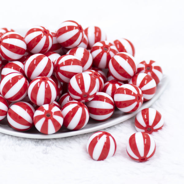 Front view of a pile of 20mm Red with White Stripe Beach Ball Bubblegum Beads