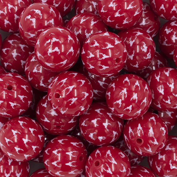 Close up view of pile of 20mm Red with White Reindeer Print Chunky Acrylic Bubblegum Beads [10 Count]