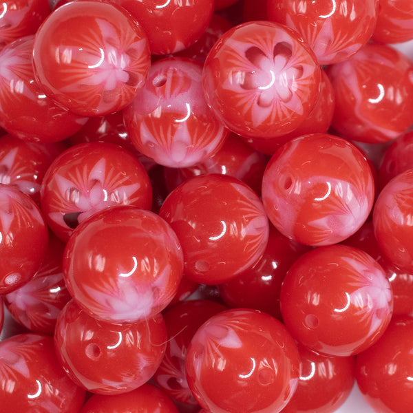close up view of a pile of 20mm Red with White Marble Flower Bubblegum Beads