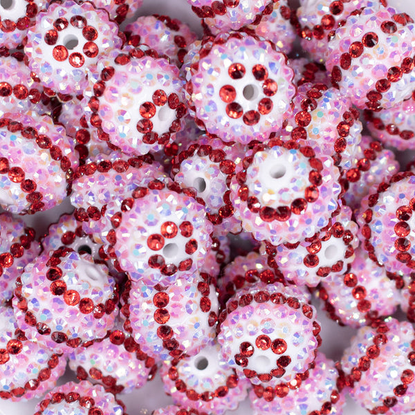 close up view of a pile of 20mm Pink, Red and White Striped Rhinestone AB Bubblegum Beads
