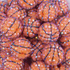 close up view of a pile of 20mm Basketball Print with Clear Rhinestone Bubblegum Beads