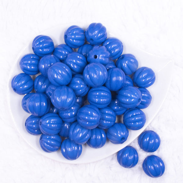 top view of a pile of 20mm Royal Blue Opaque Pumpkin Shaped Bubblegum Bead