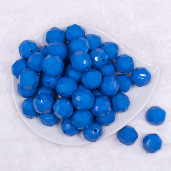 Top view of a pile of Front view of a pile of 20mm Royal Blue Faceted Opaque Bubblegum Beads