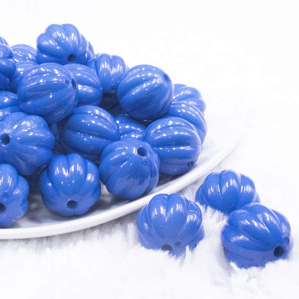 front view of a pile of 20mm Royal Blue Opaque Pumpkin Shaped Bubblegum Bead