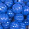 Close up view of a pile of 20mm Royal Blue Opaque Pumpkin Shaped Bubblegum Bead