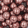 Close up view of a pile of 20mm Rusty Brown Faux Pearl Bubblegum Beads