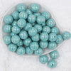 Top view of a pile of 20mm Seafoam Blue Solid AB Bubblegum Beads