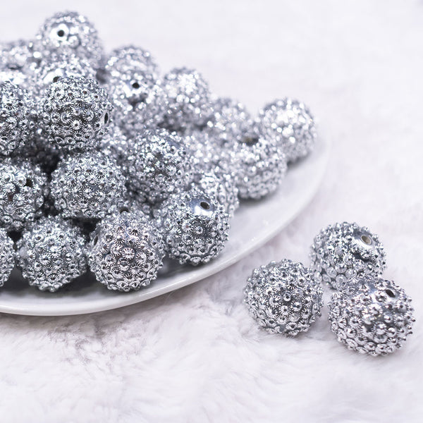 Front view of a pile of 20mm Silver Flower Rhinestone Bubblegum Beads