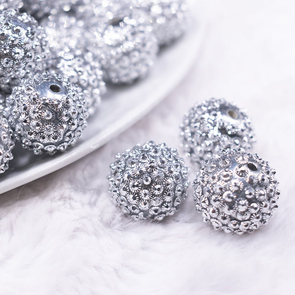 Macro view of a pile of 20mm Silver Flower Rhinestone Bubblegum Beads
