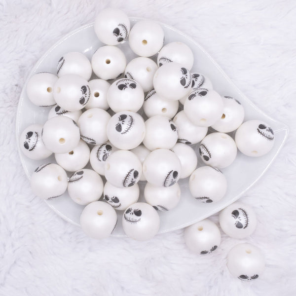 top view of a pile of 20MM White Skull Face Halloween Bubblegum Beads