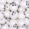 close up view of a pile of 20MM White Skull Face Halloween Bubblegum Beads