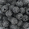 Close up view of a pile of 20mm Smokey Silver Rhinestone AB Bubblegum Beads