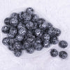 top view of a pile of 20mm Black & White Snake Print Bubblegum Beads