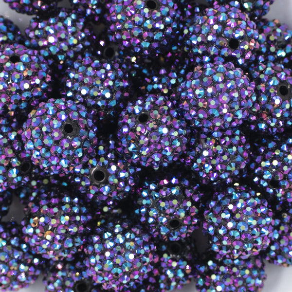 Close up view of a pile of 20mm Sparkling Wine Rhinestone AB Bubblegum Beads