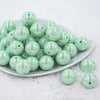 Front view of a pile of 20MM Spearmint Green AB Solid Chunky Bubblegum Beads