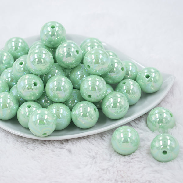 Front view of a pile of 20MM Spearmint Green AB Solid Chunky Bubblegum Beads