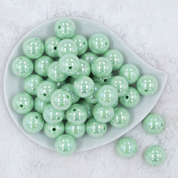 Top view of a pile of 20MM Spearmint Green AB Solid Chunky Bubblegum Beads