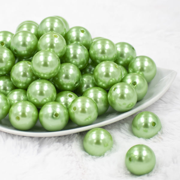 Front view of a pile of 20mm Spring Green Faux Pearl Bubblegum Beads