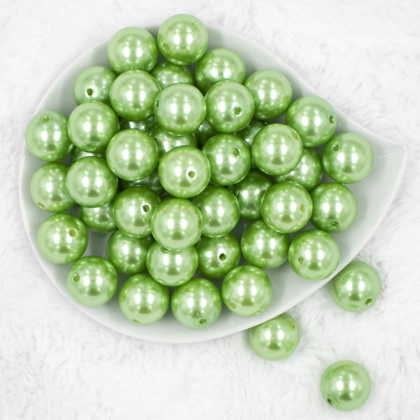 Top view of a pile of 20mm Spring Green Faux Pearl Bubblegum Beads
