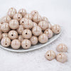 Front view of a pile of 20MM Tan AB Solid Chunky Bubblegum Beads