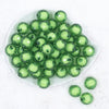 Top view of a pile of 20mm Green Translucent Faceted Bead in a bead Bubblegum Bead