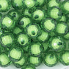 Close up view of a pile of 20mm Green Translucent Faceted Bead in a bead Bubblegum Bead