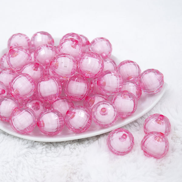Front view of a pile of 20mm Pink Translucent Faceted Bead in a bead Bubblegum Bead