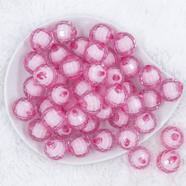 Top view of a pile of 20mm Pink Translucent Faceted Bead in a bead Bubblegum Bead