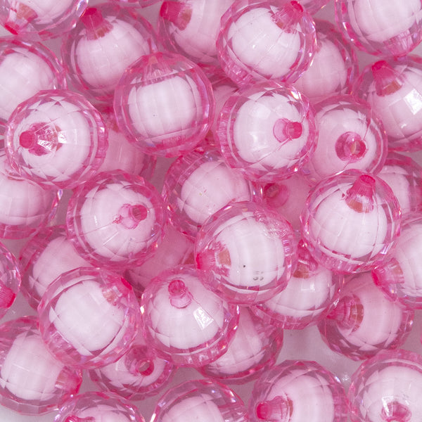 Close up view of a pile of 20mm Pink Translucent Faceted Bead in a bead Bubblegum Bead