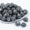 Front view of a pile of 20mm Black with Silver Chevron Bubblegum Beads