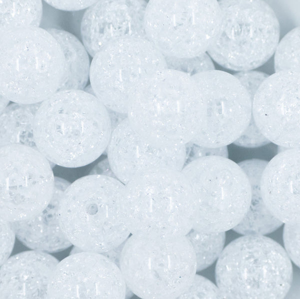 Close up view of a pile of 20mm White Crackle Bubblegum Beads