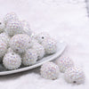Front view of a pile of 20mm White Flower Rhinestone Bubblegum Beads