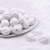 Front view of a pile of 20mm White Opaque Pumpkin Shaped Bubblegum Bead