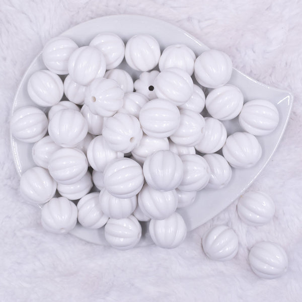 Top view of a pile of 20mm White Opaque Pumpkin Shaped Bubblegum Bead