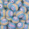Close up view of a pile of 20mm Pastel Striped Rhinestone AB Bubblegum Beads