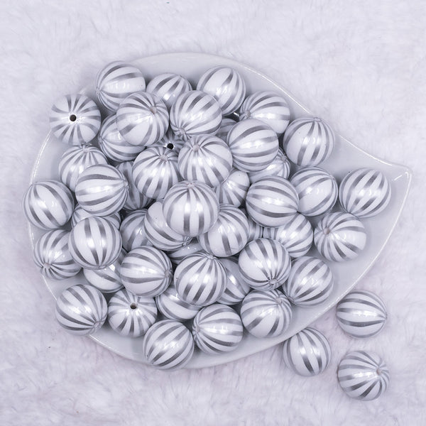 Top view of a pile of 20mm White with Silver Pin Stripes Acrylic Bubblegum Beads