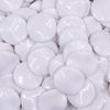 Close up  view of a pile of 20mm White Opaque Wavy Flat Shaped Jewelry Bead
