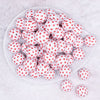 top view of a pile of 20mm Red Confetti Hearts on White opaque Acrylic Bubblegum Beads