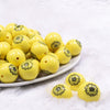 Front view of a pile of 20mm Sunflower print on Yellow Chunky Acrylic Bubblegum Beads [10 Count]
