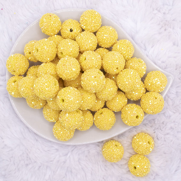 top view of a pile of 20mm Yellow Sequin Confetti Bubblegum Beads