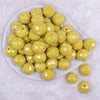 top view of a pile of 20mm Yellow Disco Faceted AB Bubblegum Beads