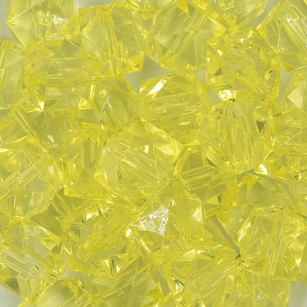 Close up view of a pile of 20mm Yellow Transparent Cube Faceted Pearl Bubblegum Beads
